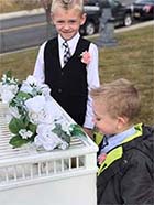 two boys and doves